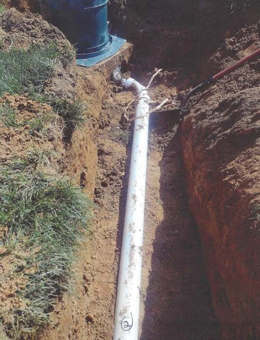 Excavated septic line area prepared for system design and field evaluation in Maryland