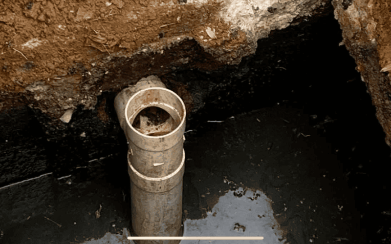 Installed septic riser and tank opening during septic installation in Maryland
