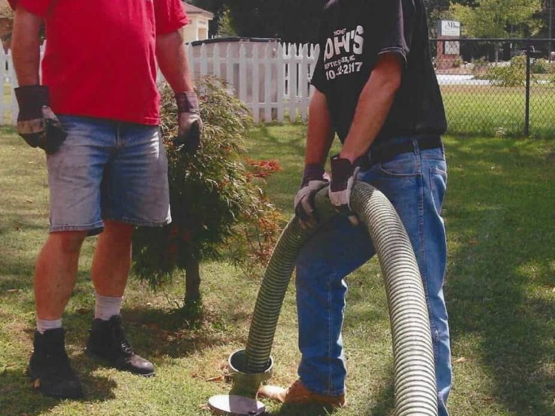 John’s Septic Service technician checking a residential septic access point in Harford County, Maryland